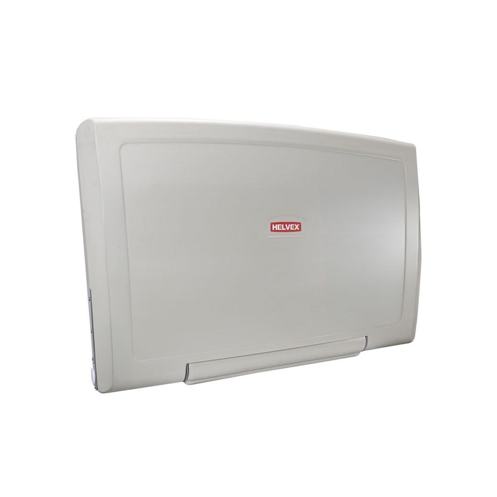 Cambiador de pañal plegable a pared soporta hasta 20 kg de peso. Con compartimiento de almacena - miento.